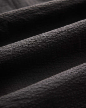 material shot of the collar on The Short Sleeve Jack in Faded Black Seersucker, Wovens by Taylor Stitch