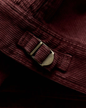 material shot of the buckle on The Piston Jacket in Dried Cherry Corduroy, Outerwear by Taylor Stitch