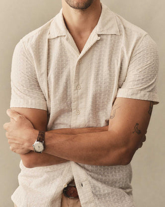 fit model showing off The Davis Shirt in Vintage White Embroidered Stripe