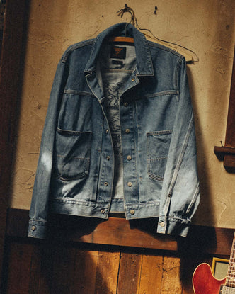 editorial image of The Haight Jacket in Light Wash Hemp Denim hanging