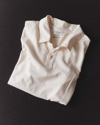 folded flatlay of The Cotton Hemp Polo in Vintage White
