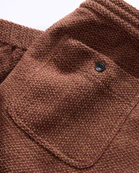 material shot of the back pocket of The Apres Pant in Black Cherry Sashiko, Bottoms by Taylor Stitch