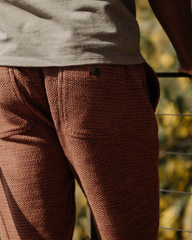 fit model showing the back of The Apres Pant in Black Cherry Sashiko, Bottoms by Taylor Stitch
