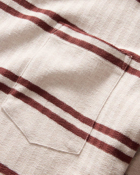 material shot of the chest pocket on The Colton Crew in Oat Heathered Stripe, Knits by Taylor Stitch