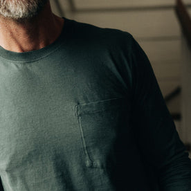fit model showing the front chest pocket on The Cotton Hemp Long Sleeve Tee in Dark Forest