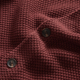 material shot of the buttons on The Crawford Sweater in Black Cherry