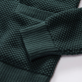 material shot of the sleeves on The Crawford Sweater in Dark Forest