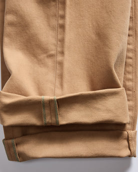 material shot of the selvage cuffs on The Democratic All Day Pant in Tobacco Selvage Denim, Bottoms by Taylor Stitch