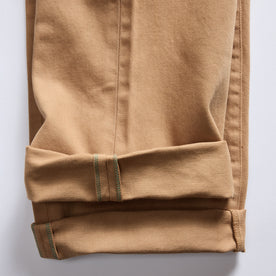 material shot of the selvage cuffs on The Democratic All Day Pant in Tobacco Selvage Denim