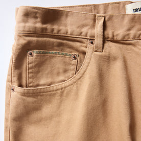 material shot of the pockets on The Democratic All Day Pant in Tobacco Selvage Denim