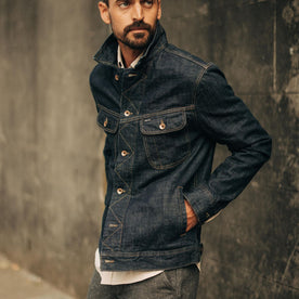 fit model posing in The Long Haul Jacket in Rinsed Organic Selvage