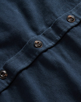 material shot of the buttons on The Maritime Shirt Jacket in Dark Navy Moleskin, Wovens by Taylor Stitch