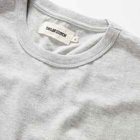 material shot of the collar on The Organic Cotton Tee in Heather Grey