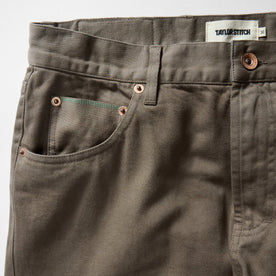 material shot of the pockets on The Slim All Day Pant in Fatigue Olive Selvage Denim
