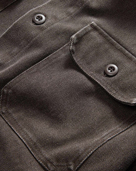 material shot of the pockets on The Shop Shirt in Soil Chipped Canvas, Wovens by Taylor Stitch