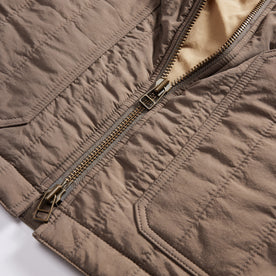 material shot of the two way zipper on The Able Jacket in Morel Quilted Nylon