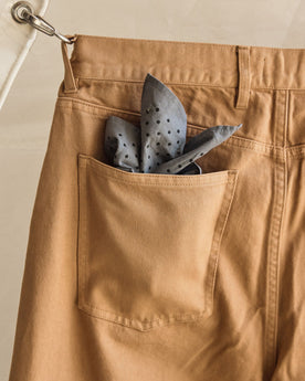 editorial image of The Bandana in Slate Blue in back pocket, Accessories by Taylor Stitch