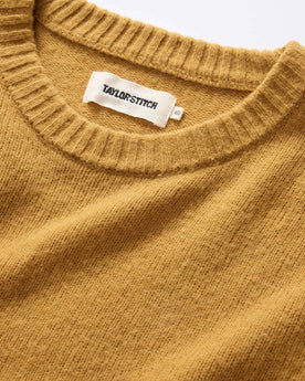 material shot of ribbed neck opening on The Lodge Sweater in Gold, Knits by Taylor Stitch