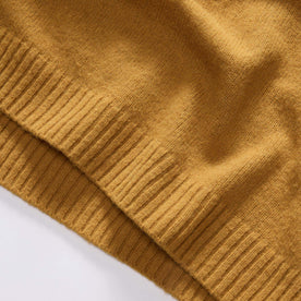 material shot of the ribbed hem on The Lodge Sweater in Gold