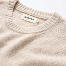 material shot of the ribbed neck opening on The Lodge Sweater in Oat