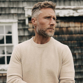 fit model showing the front of The Lodge Sweater in Oat