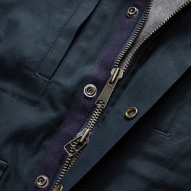 material shot of the zipper on The Pathfinder Jacket in Dark Navy Dry Wax