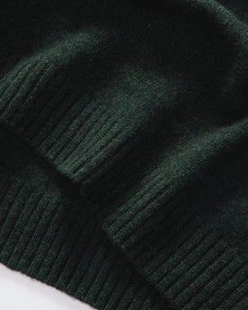 material shot of the ribbed hem on The Lodge Sweater in Black Pine, Knits by Taylor Stitch