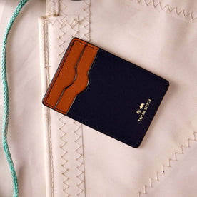 editorial flatlay for The Minimalist Wallet in Navy