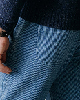 fit model showing off the back pocket on The Apres Pant in Washed Indigo Sashiko , Bottoms by Taylor Stitch