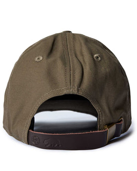 editorial image of the back of The Pathfinder Cap in Fatique Olive Dry Wax, Accessories by Taylor Stitch