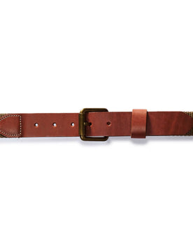 editorial flatlay of The Webbed Belt in Whiskey buckled up, Accessories by Taylor Stitch