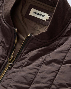 material shot of the collar on The Able Jacket in Soil Quilted Nylon, Outerwear by Taylor Stitch