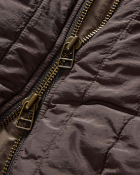 material shot of the zipper on The Able Jacket in Soil Quilted Nylon, Outerwear by Taylor Stitch