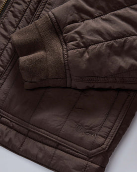 material shot of the cuff on The Able Jacket in Soil Quilted Nylon, Outerwear by Taylor Stitch