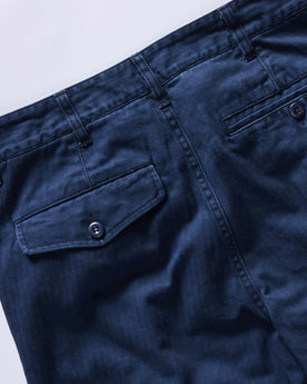 material shot of the back pocket on The Matlow Pant in Dark Navy Herringbone, Bottoms by Taylor Stitch