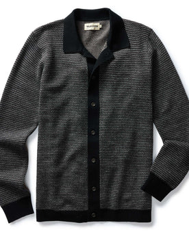 flatlay of The Nichols Polo in Black Birdseye Merino, Knits by Taylor Stitch