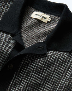 material shot of the collar on The Nichols Polo in Black Birdseye Merino, Knits by Taylor Stitch