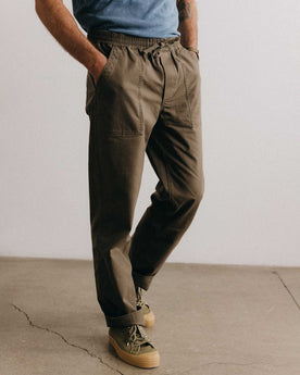 fit model walking in The Breakwater Pant in Mushroom Ripstop, Bottoms by Taylor Stitch