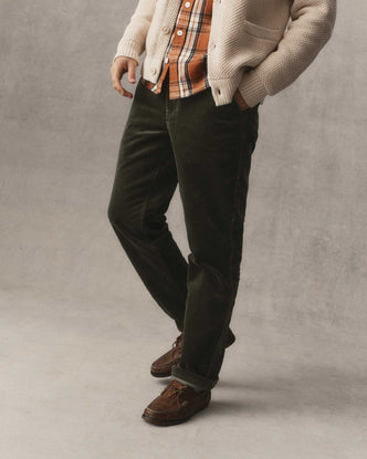 fit model posing in The Carnegie Pant in Smoked Olive Corduroy