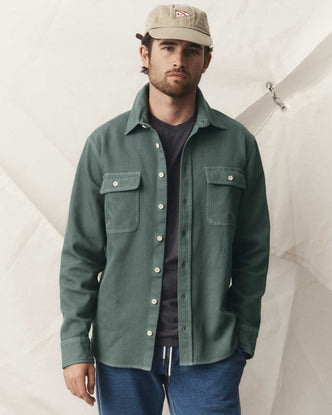 fit model posing in The Ledge Shirt in Deep Sea Twill