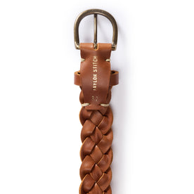 material shot of the Taylor Stitch logo on The Braided Belt in Whiskey