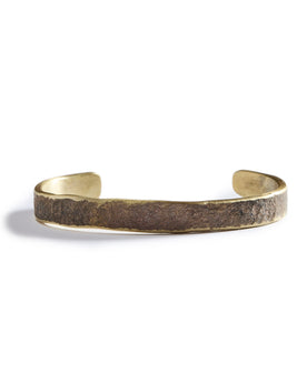 flatlay of The Hammered Cuff in Brass, Accessories by Taylor Stitch