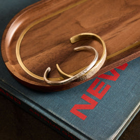 The Hammered Cuff in Brass on a Valet Tray