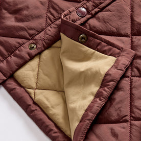 material shot of the snap buttons on The Miller Shirt Jacket in Burgundy