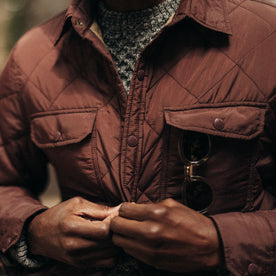 fit model showing the quilted front on The Miller Shirt Jacket in Burgundy