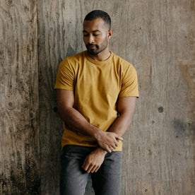 fit model in The Organic Cotton Tee in Old Gold