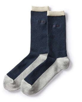 flatlay of The Ribbed Sock in Navy, Accessories by Taylor Stitch