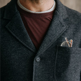 fit model showing the front lapel of The Ridgewood Cardigan in Charcoal Birdseye Wool