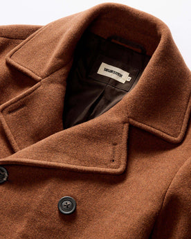 material shot of the double breasted front of The Mariner Coat in Tarnished Copper Wool, Outerwear by Taylor Stitch