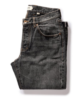 flatlay of The Democratic Jean in Black 1-Year Wash Selvage Denim, Bottoms by Taylor Stitch